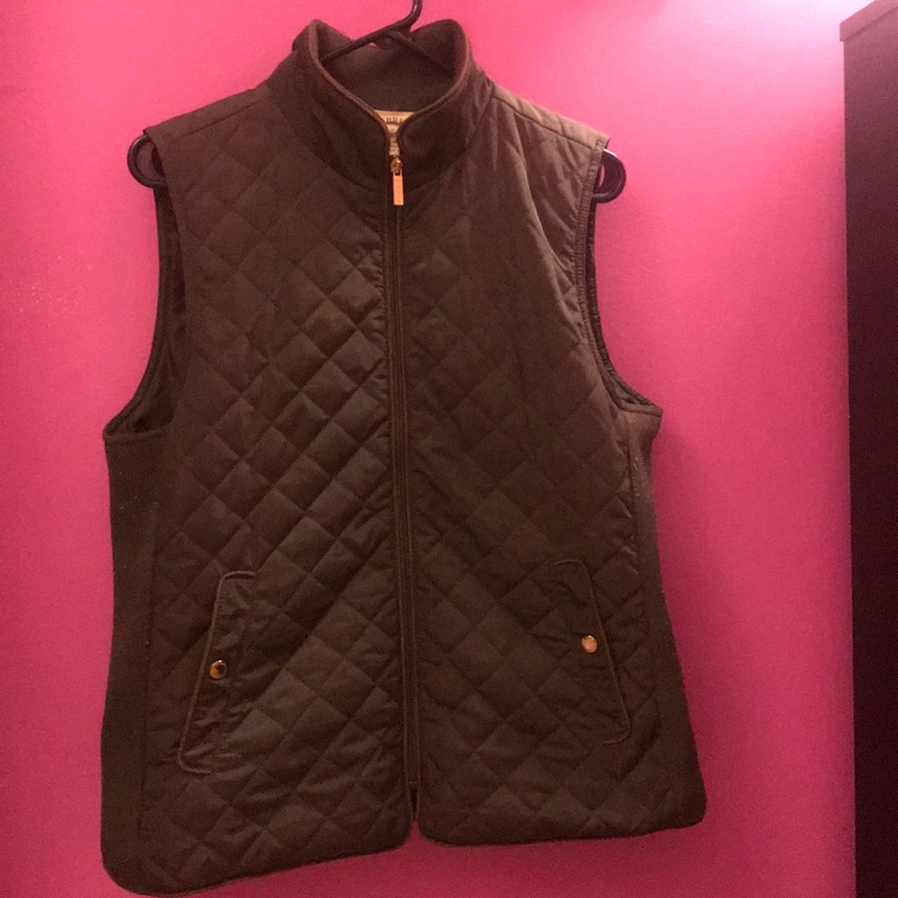 Army green vest with gold zipper and buttons.